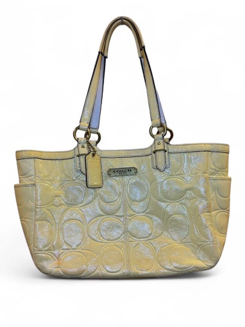 SOLD
COACH pastel yellow patent leather signature bag with baby pink liner